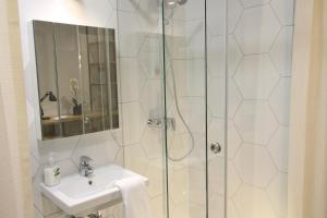 Kúpeľňa v ubytovaní Apartamenty Garbary 3