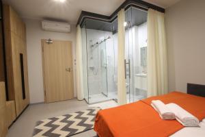 Posteľ alebo postele v izbe v ubytovaní Apartamenty Garbary 3