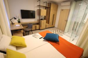 Posteľ alebo postele v izbe v ubytovaní Apartamenty Garbary 3