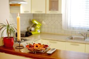 Kuchyň nebo kuchyňský kout v ubytování Apartments Ana + 37 fotografií
