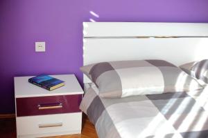 Postel nebo postele na pokoji v ubytování Apartments Ana
