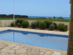 Bazén v ubytování Aphrodite Sands Resort nebo v jeho okolí