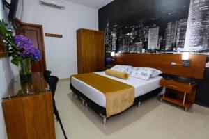 Cama o camas de una habitación en Hotel Sauces del Estadio