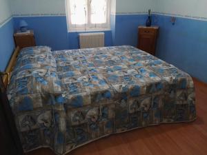A bed or beds in a room at Fontana's House Relax