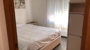 Postel nebo postele na pokoji v ubytování SI Apartamentos Benicassim