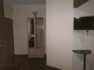 TV a/nebo společenská místnost v ubytování Strops