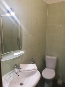 Een badkamer bij Strops