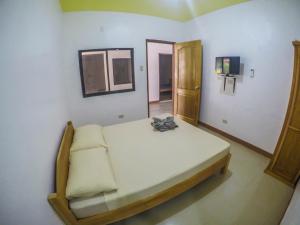 Postel nebo postele na pokoji v ubytování Ocean Manor Inn