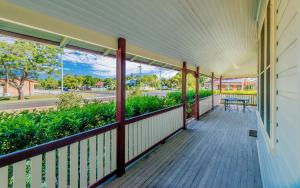 a porch with a view of a street at Ithaca in Grafton