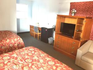 TV a/nebo společenská místnost v ubytování All Seasons Motel