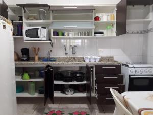 Køkken eller tekøkken på Casa com Quintal Amplo