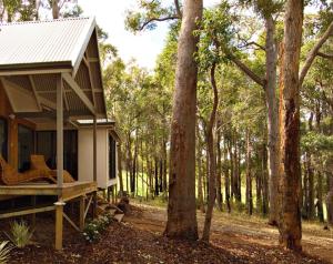 a small house in the middle of a forest at Chandeliers on Abbey in Yallingup