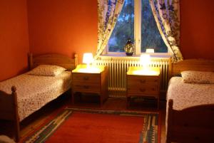 Ein Bett oder Betten in einem Zimmer der Unterkunft B&B Villa Solhaga
