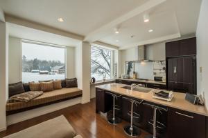 Køkken eller tekøkken på Echoland Apartments + 10 billeder