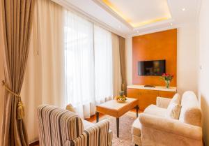 TV a/nebo společenská místnost v ubytování Alba Hotel Meru