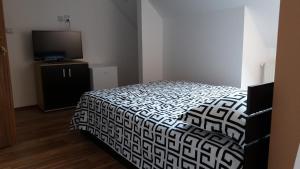 Postel nebo postele na pokoji v ubytování Hotel Marasesti