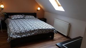 Postel nebo postele na pokoji v ubytování Hotel Marasesti