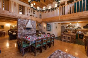 a large dining room with a table and chairs at Villa Oliva Bribir in Bribir