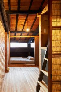 Postel nebo postele na pokoji v ubytování Hostel & Tatami Bar Uchikobare -内子晴れ-