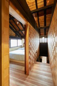 Postel nebo postele na pokoji v ubytování Hostel & Tatami Bar Uchikobare -内子晴れ-