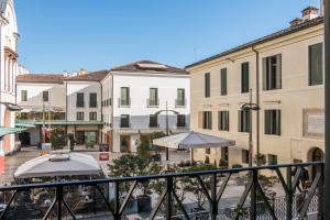 a view from a balcony of a city with buildings at Suite Latina - San Leonardo in Treviso
