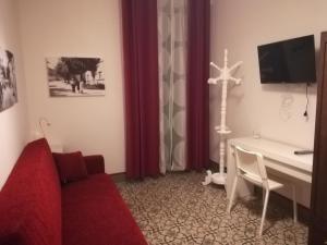 TV a/nebo společenská místnost v ubytování B&B la cascata