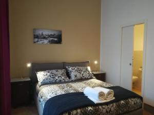 Postel nebo postele na pokoji v ubytování B&B la cascata