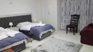 Postel nebo postele na pokoji v ubytování Hotel Livia