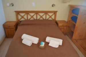 En eller flere senge i et værelse på Alamos