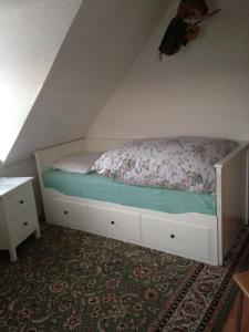 Tempat tidur dalam kamar di Haus Spreewaldimkerei