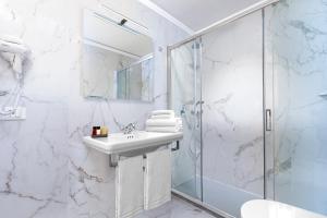 Kúpeľňa v ubytovaní La Fontanina Suites