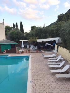 The swimming pool at or close to Avgoustina Venus Studios