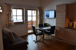 TV a/nebo společenská místnost v ubytování Appartement Herzog + 17 fotografií