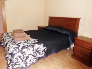 Postel nebo postele na pokoji v ubytování Hostal Abastos