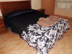 Postel nebo postele na pokoji v ubytování Hostal Abastos