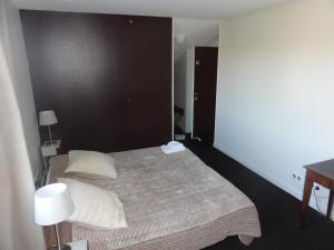 Krevet ili kreveti u jedinici u okviru objekta Hotel La Longue Vue