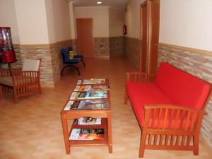 Posezení v ubytování Hostal Abastos