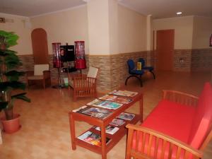Posezení v ubytování Hostal Abastos