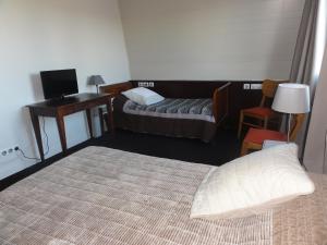 Krevet ili kreveti u jedinici u okviru objekta Hotel La Longue Vue