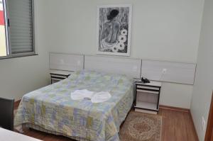 Postel nebo postele na pokoji v ubytování Hotel Lisbor