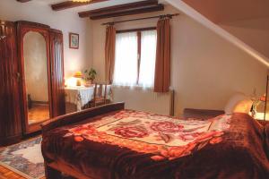 Posteľ alebo postele v izbe v ubytovaní Apartman Maryla
