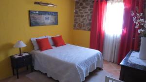 Cama ou camas em um quarto em Quinta da Ribeira