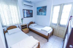Postel nebo postele na pokoji v ubytování Kaplan Hotel + 19 fotografií