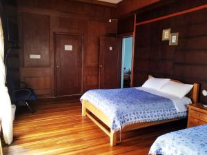 Letto o letti in una camera di Travellers Inn