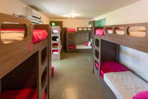 Llit o llits en una habitació de Concept Design Hostel & Suites