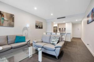 Zona de estar de Astra Apartments Newcastle Beach