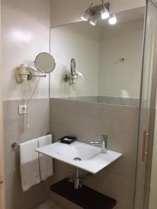 Koupelna v ubytování Alameda Hostal Boutique