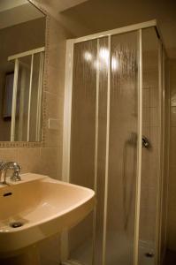 a bathroom with a shower and a sink at 1410 Castello in Venice