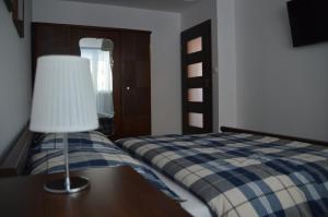 Postel nebo postele na pokoji v ubytování Apartament Izerski Klimat