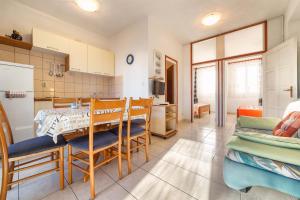 Kuchyň nebo kuchyňský kout v ubytování Apartments Zanze + 37 fotografií